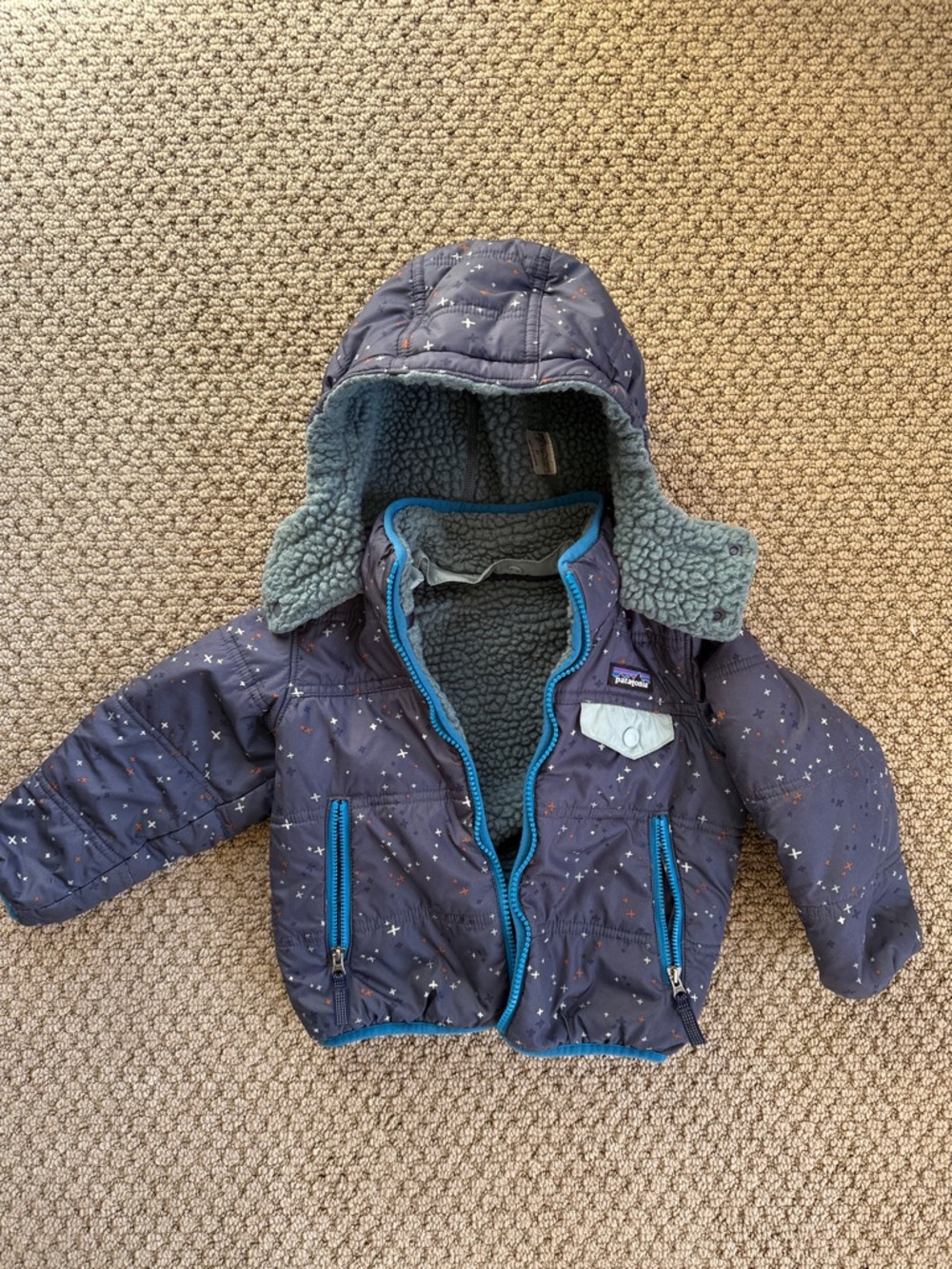 Patagonia Tribbles Navy Star-Print Puffer Jacket with Bright Blue Trim